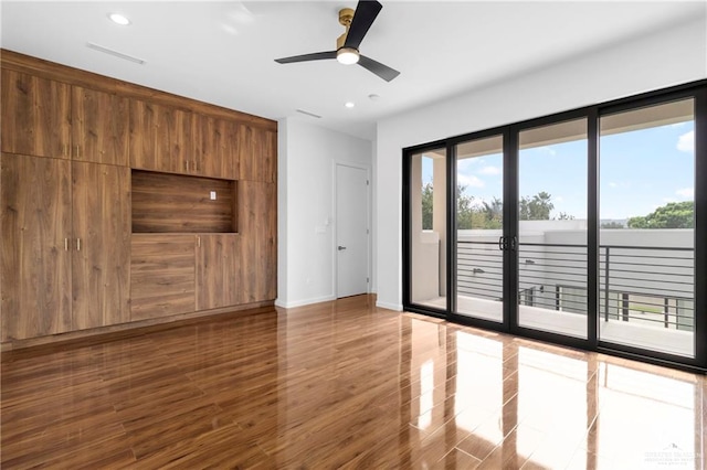 2228 S 45th St, Mcallen, TX 78503 - unfurnished room with baseboards, recessed lighting, a ceiling fan, and wood finished floors