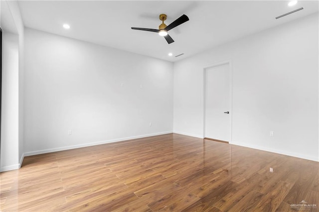 2228 S 45th St, Mcallen, TX 78503 - unfurnished room featuring ceiling fan, wood finished floors, baseboards, and recessed lighting