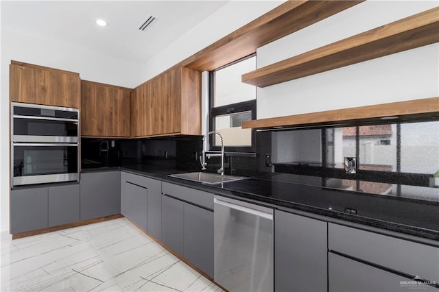 2228 S 45th St, Mcallen, TX 78503 - kitchen with open shelves, a sink, appliances with stainless steel finishes, and light marble finish flooring