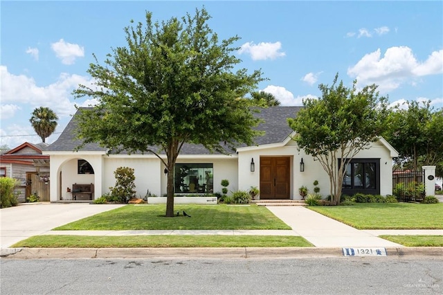 1321 W Maple Ave, Mcallen, TX 78501 - view of front of house with stucco siding and a shingled roof