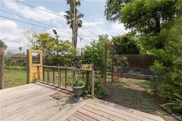701 S Parker Rd S, La Feria, TX 78559 - wooden deck featuring a fenced backyard