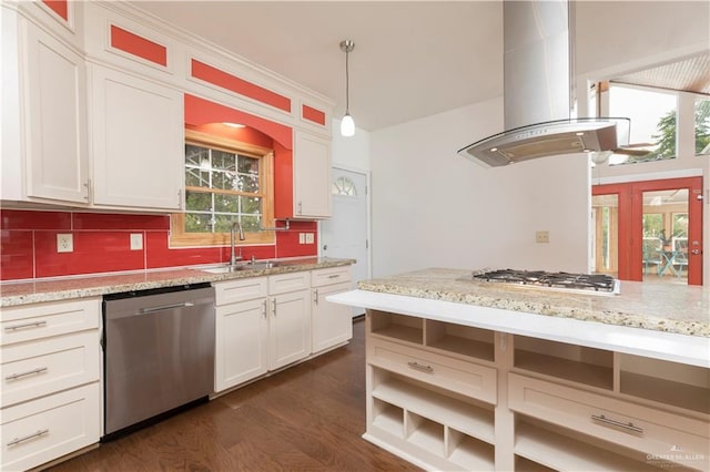 701 S Parker Rd S, La Feria, TX 78559 - kitchen featuring appliances with stainless steel finishes, island exhaust hood, a sink, and decorative backsplash