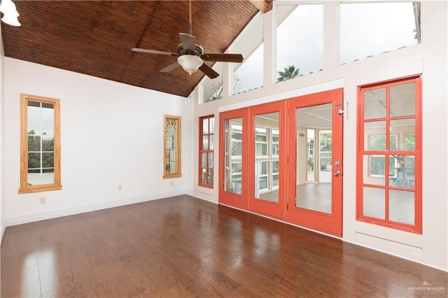 701 S Parker Rd S, La Feria, TX 78559 - spare room featuring wood finished floors, a ceiling fan, wood ceiling, high vaulted ceiling, and baseboards