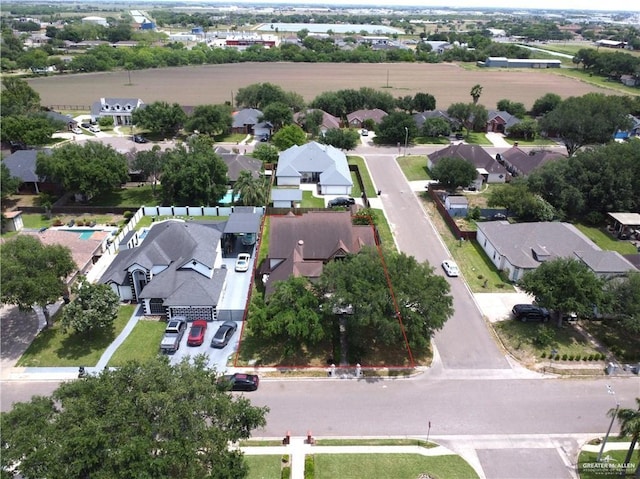2206 Highland Dr, Weslaco, TX 78599 - aerial perspective of suburban area featuring property parcel outlined