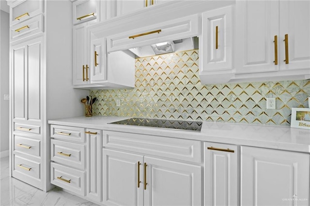 kitchen featuring white cabinetry, black electric stovetop, backsplash, and light stone counters