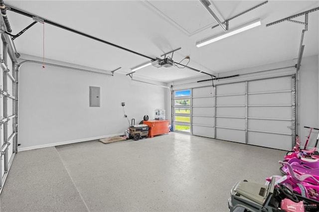 garage featuring a garage door opener and electric panel