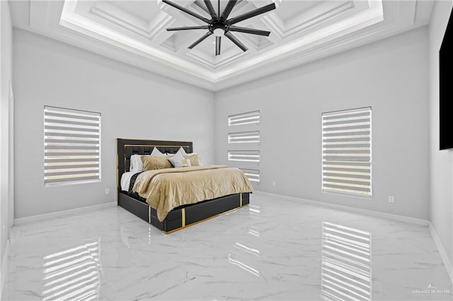 bedroom with a high ceiling, ornamental molding, coffered ceiling, and ceiling fan