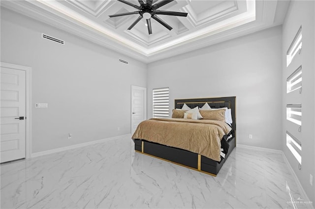 bedroom with multiple windows, a towering ceiling, coffered ceiling, and ceiling fan