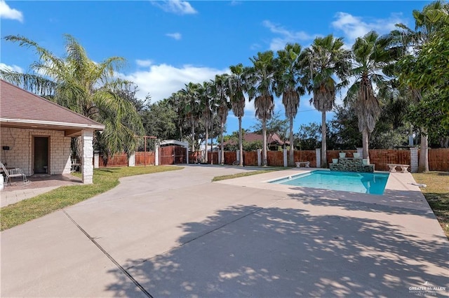 view of pool with a patio area, fence private yard, and a fenced in pool