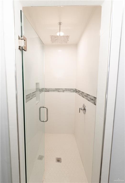 full bath with a stall shower and visible vents