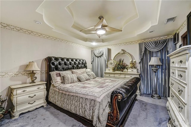 228 Oak Ridge Dr, Rio Grande City, TX 78582 - bedroom with a raised ceiling, carpet, and ceiling fan