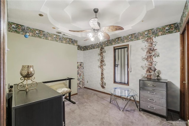 228 Oak Ridge Dr, Rio Grande City, TX 78582 - office area with a raised ceiling, light colored carpet, ceiling fan, and baseboards