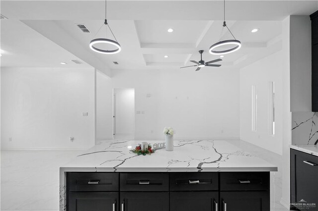 132 E Irvine Ave, Alamo, TX 78516 - kitchen featuring ceiling fan, recessed lighting, coffered ceiling, and dark cabinets