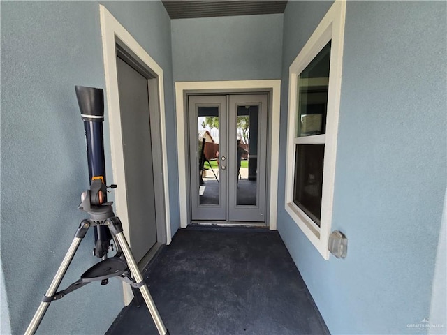 doorway to property featuring french doors