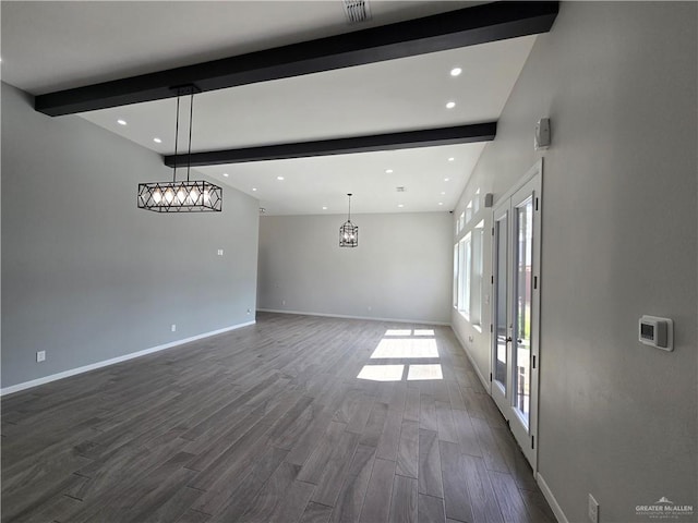 unfurnished living room with beamed ceiling, french doors, and dark hardwood / wood-style floors