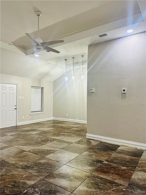 unfurnished room with vaulted ceiling and ceiling fan