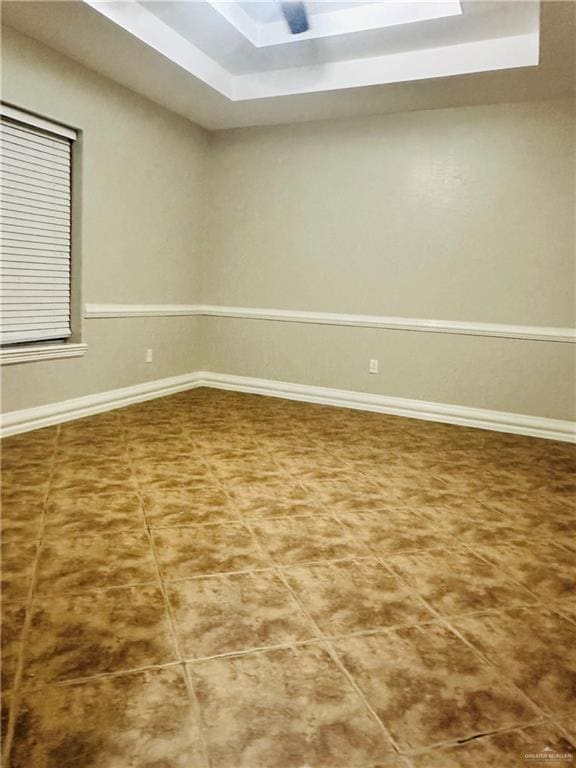 empty room with tile patterned flooring