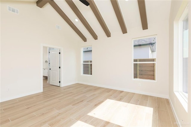 1027 Broken Arrow Dr, Alamo, TX 78516 - empty room featuring beam ceiling, light wood-style floors, baseboards, high vaulted ceiling, and recessed lighting