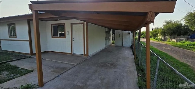 exterior space featuring a carport