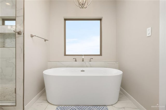 8101 N 5th St, Mcallen, TX 78504 - bathroom featuring marble finish floor, a soaking tub, baseboards, and a walk in shower