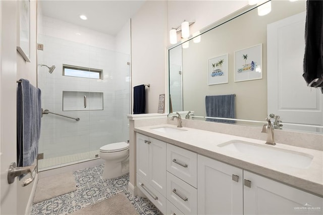 8101 N 5th St, Mcallen, TX 78504 - full bathroom with double vanity, a sink, toilet, and a shower stall