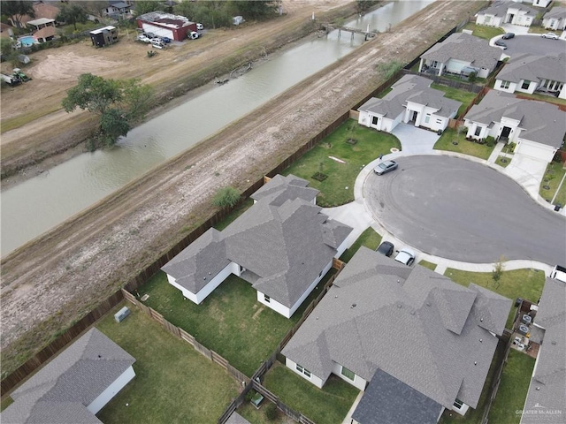 aerial view featuring a water view and a residential view