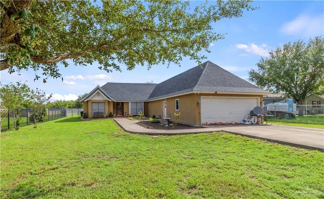 ranch-style home with a garage and a front lawn