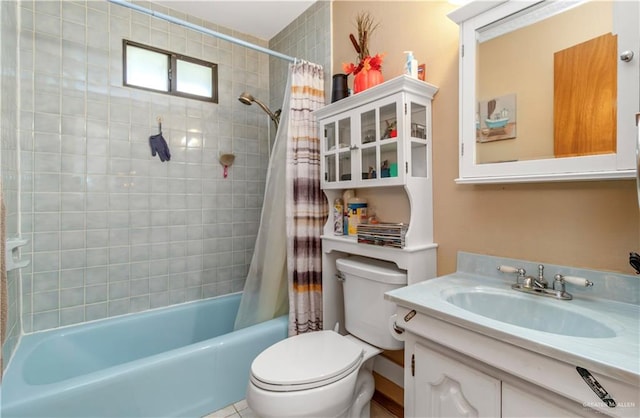 full bathroom featuring vanity, toilet, and shower / tub combo with curtain