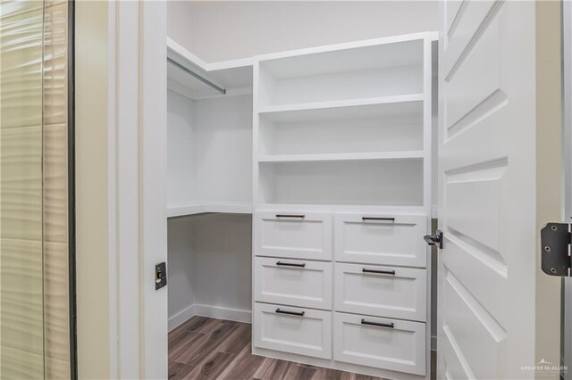 2316 Piedra St, Edinburg, TX 78542 - walk in closet featuring dark wood-style flooring