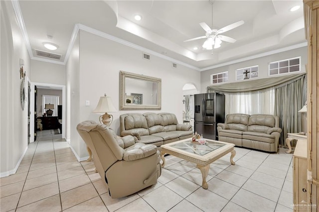 3704 San Gerardo St, Mission, TX 78572 - living room featuring ceiling fan, crown molding, visible vents, and light tile patterned floors