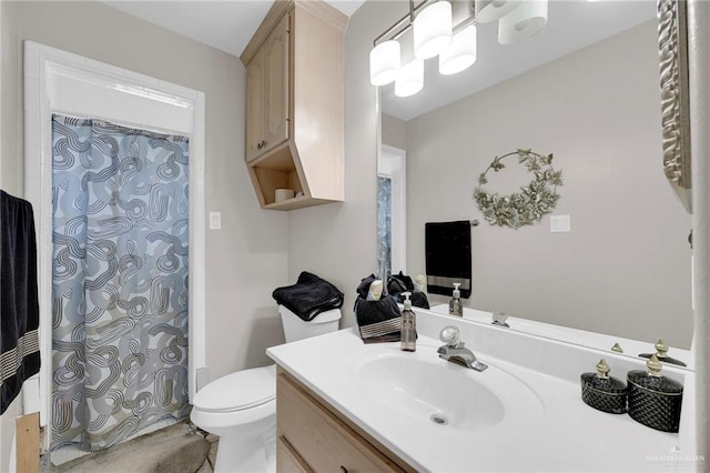 3704 San Gerardo St, Mission, TX 78572 - full bathroom with toilet, vanity, and a shower with shower curtain