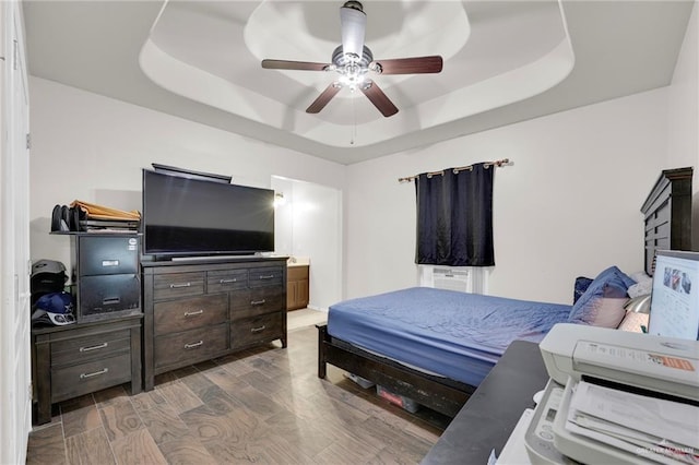 3704 San Gerardo St, Mission, TX 78572 - bedroom with a ceiling fan, wood finished floors, and a raised ceiling