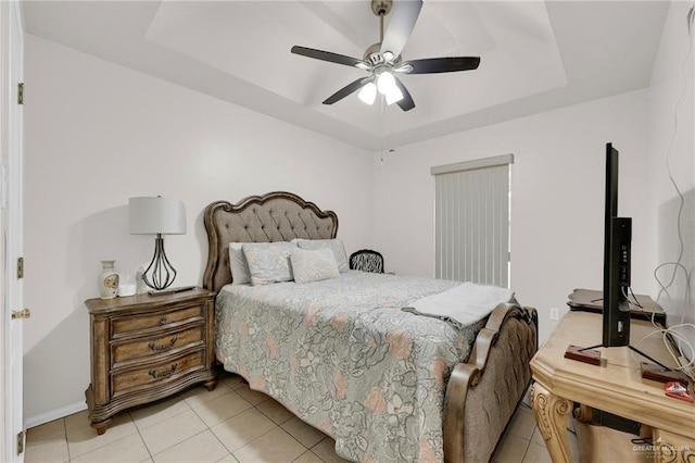 3704 San Gerardo St, Mission, TX 78572 - bedroom with a tray ceiling, a ceiling fan, baseboards, and light tile patterned floors