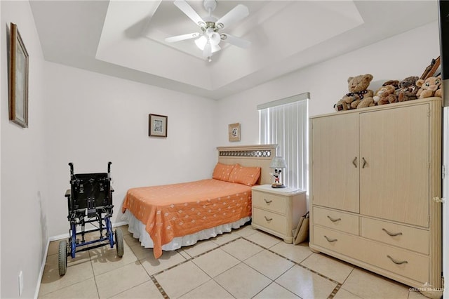 3704 San Gerardo St, Mission, TX 78572 - bedroom with a tray ceiling, a ceiling fan, and light tile patterned flooring