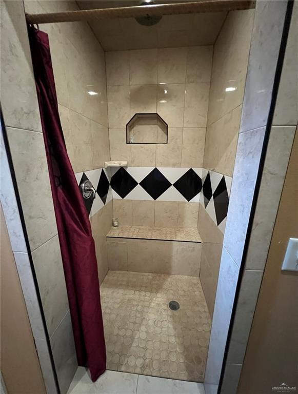 bathroom featuring walk in shower