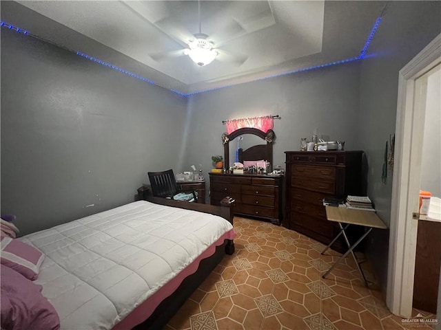 tiled bedroom with ceiling fan