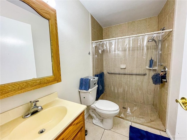 bathroom with vanity, a shower with curtain, tile patterned floors, and toilet