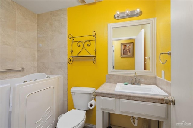 1614 Iowa St, Mission, TX 78572 - bathroom with vanity and a tub to relax in