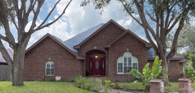 view of front of home with a front yard