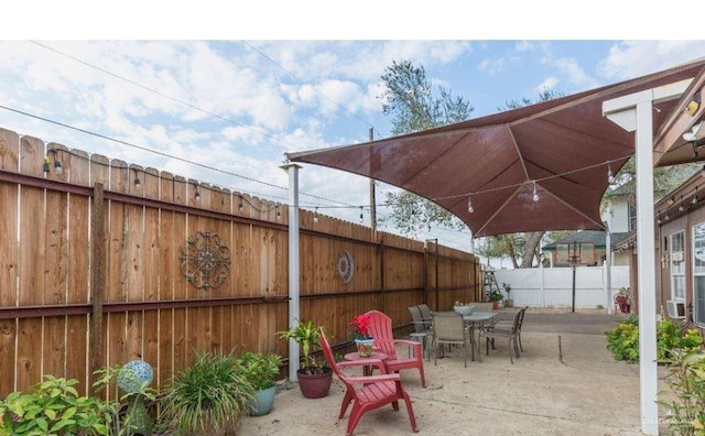 view of patio featuring cooling unit