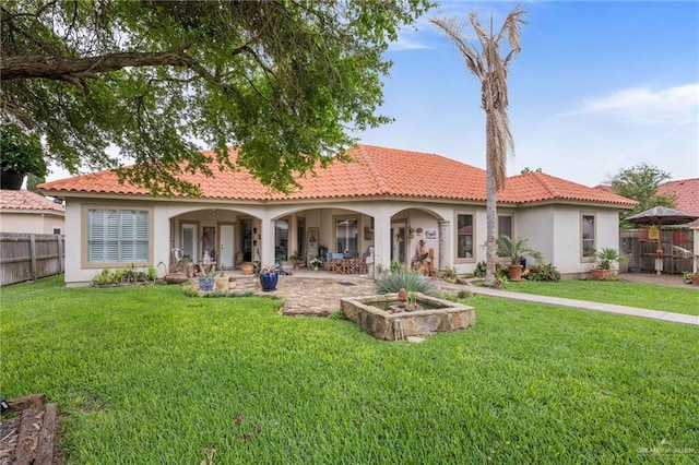 5512 Autumn Mist Ln, Brownsville, TX 78526 - back of property featuring stucco siding and a tiled roof