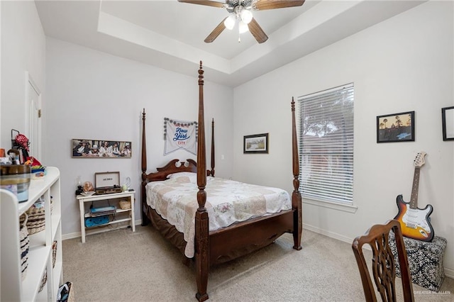 5512 Autumn Mist Ln, Brownsville, TX 78526 - bedroom featuring light carpet, a ceiling fan, and a raised ceiling