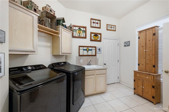 5512 Autumn Mist Ln, Brownsville, TX 78526 - laundry room featuring washing machine and clothes dryer, cabinet space, and light tile patterned floors