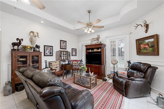 5512 Autumn Mist Ln, Brownsville, TX 78526 - living area featuring a ceiling fan, light tile patterned floors, a tray ceiling, and ornamental molding