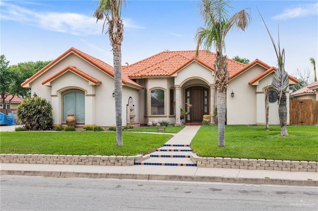 5512 Autumn Mist Ln, Brownsville, TX 78526 - mediterranean / spanish home featuring stucco siding and a tiled roof