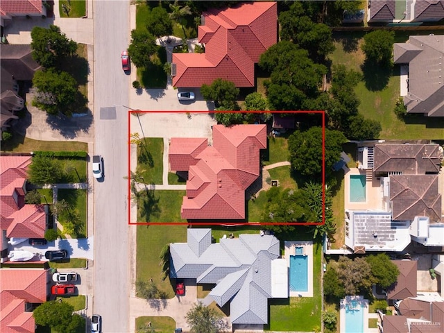 5512 Autumn Mist Ln, Brownsville, TX 78526 - aerial perspective of suburban area featuring property parcel outlined