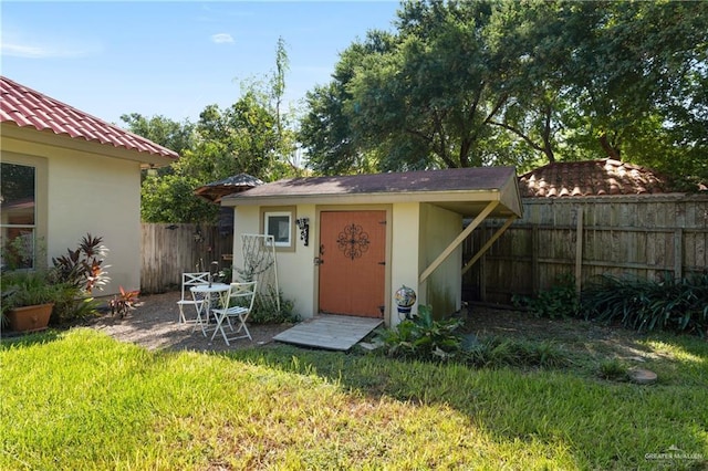 5512 Autumn Mist Ln, Brownsville, TX 78526 - view of shed with a fenced backyard