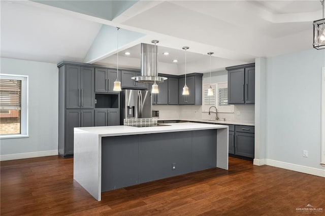 208 E Lark Ave, Mcallen, TX 78504 - kitchen with stainless steel fridge, gray cabinets, baseboards, recessed lighting, and light countertops