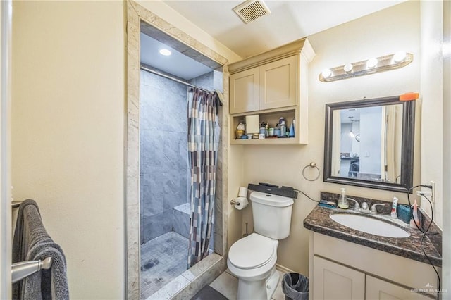 612 Valencia Ln, Brownsville, TX 78521 - full bath with toilet, a stall shower, and vanity
