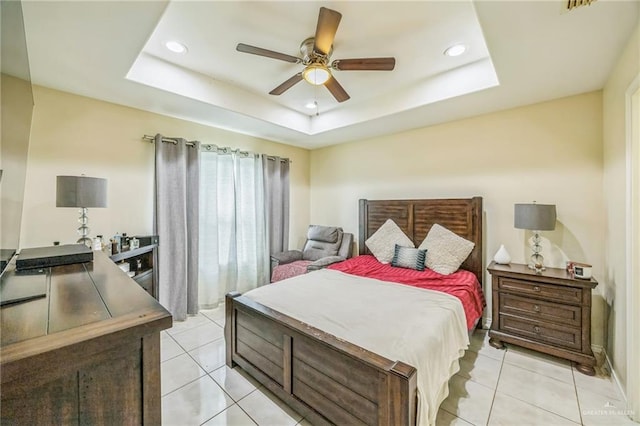 612 Valencia Ln, Brownsville, TX 78521 - bedroom with light tile patterned floors, recessed lighting, a raised ceiling, and ceiling fan